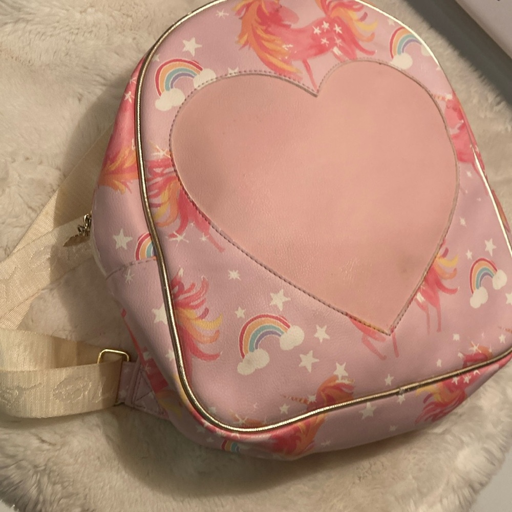 Luv Betsey unicorn heart, pink gold backpack, and great shape